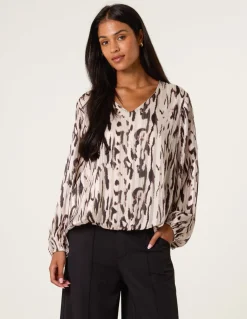 Animal Print Puffball V Neck Top