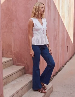 Flared Cross Over Waistband Jeans