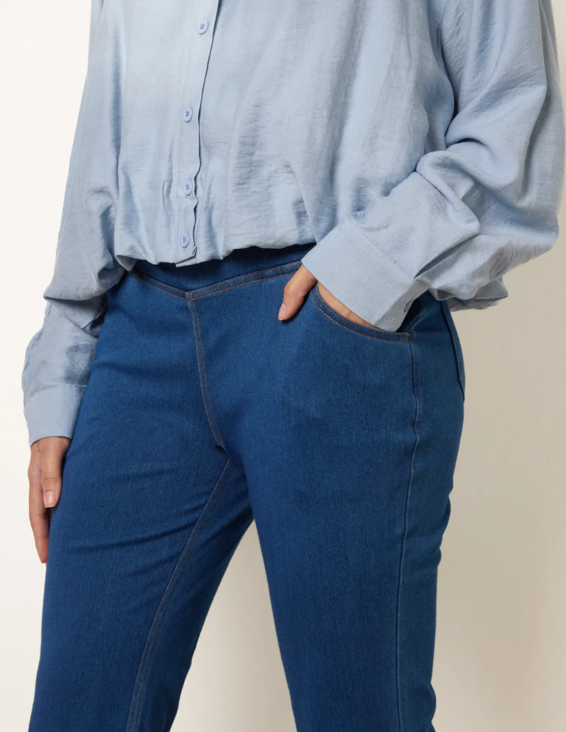 Flared Cross Over Waistband Jeans