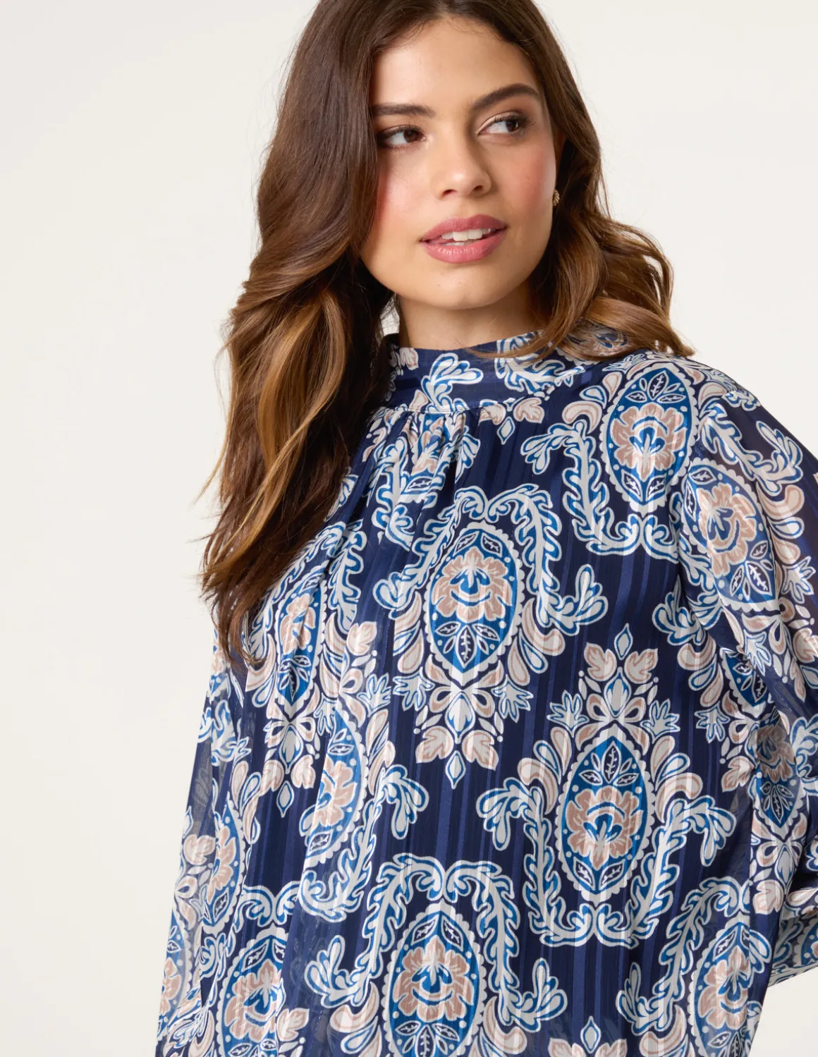High Neck Bubble Hem Printed Blouse